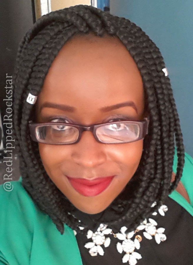 A purple smokey eye paired with a classic red&nbsp;lip